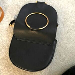 Anthropologie brand black leather purse